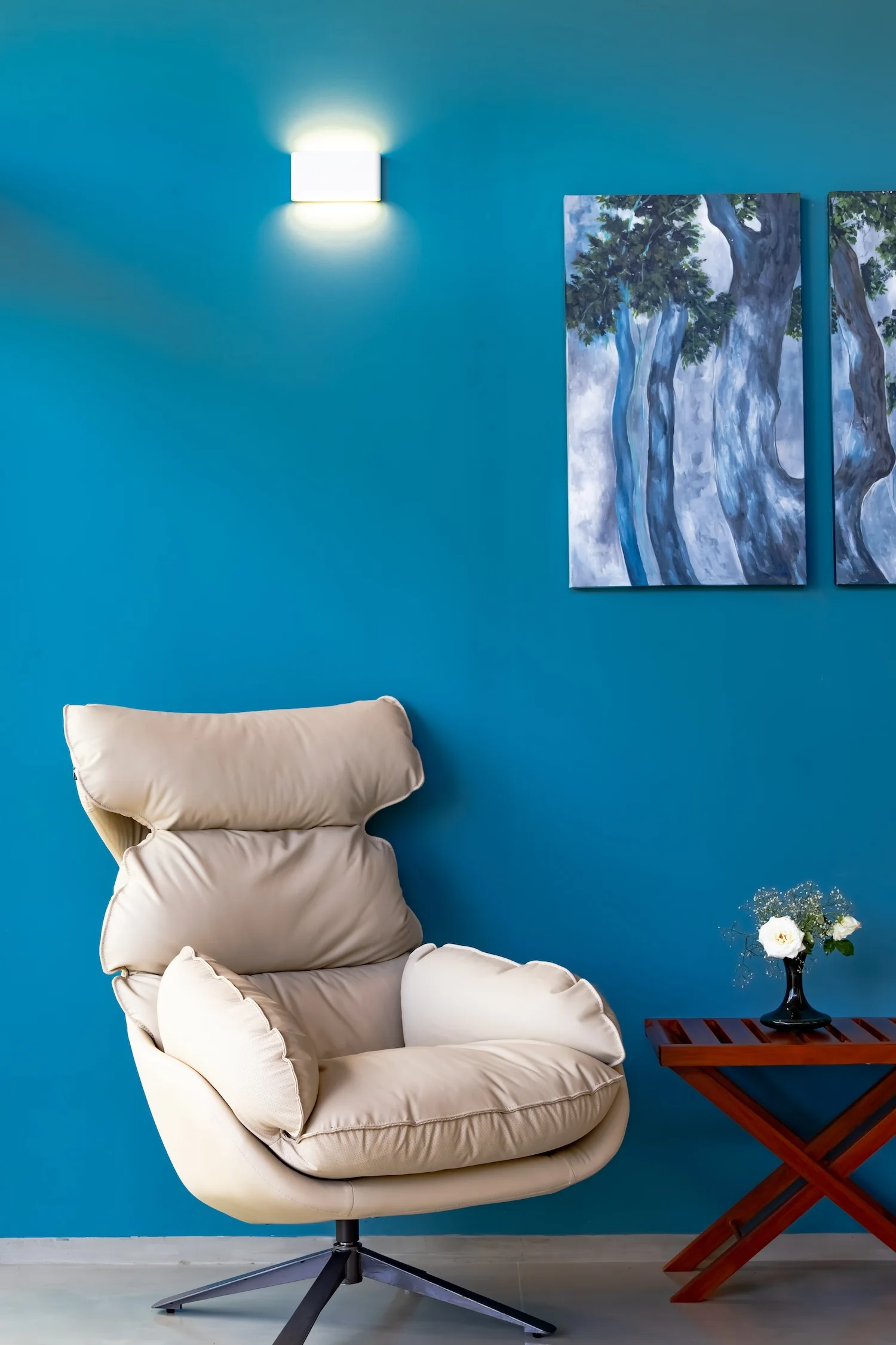Deluxe room portrait view highlighting textures, warmth, and calm interior styling
