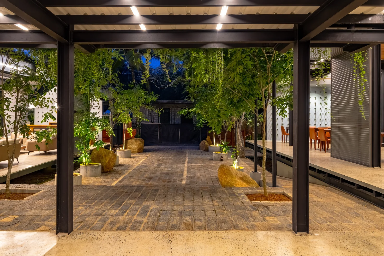 Architectural arrival view with layered greenery at BlackRoots Unawatuna