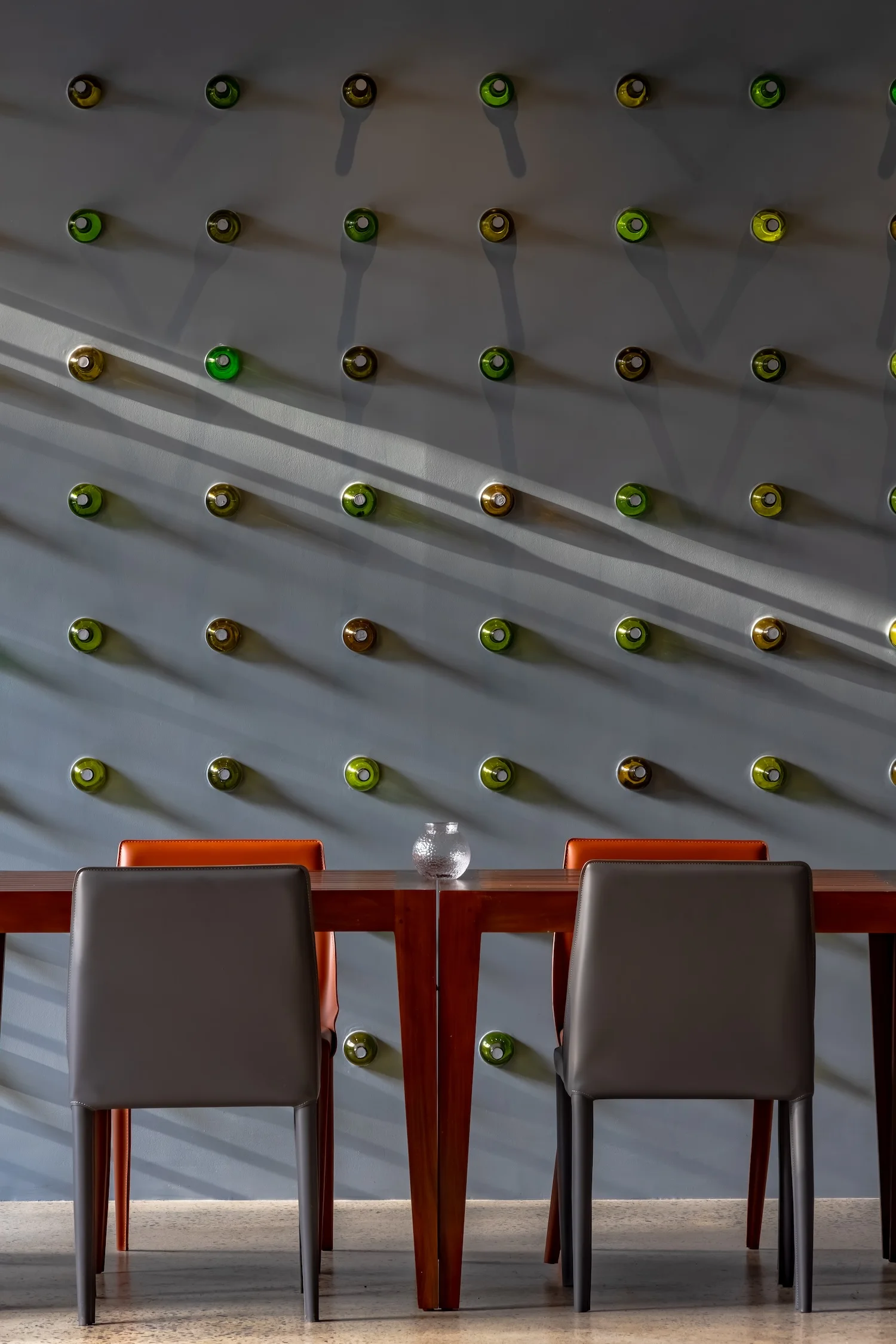 Restaurant portrait composition showcasing warm materials and relaxed hospitality