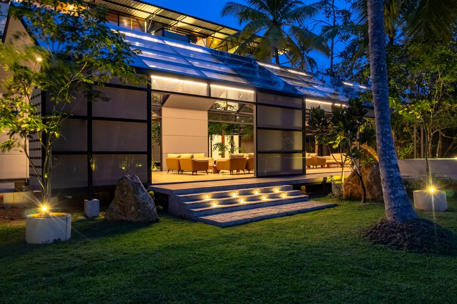 BlackRoots architecture framed by nature at dusk